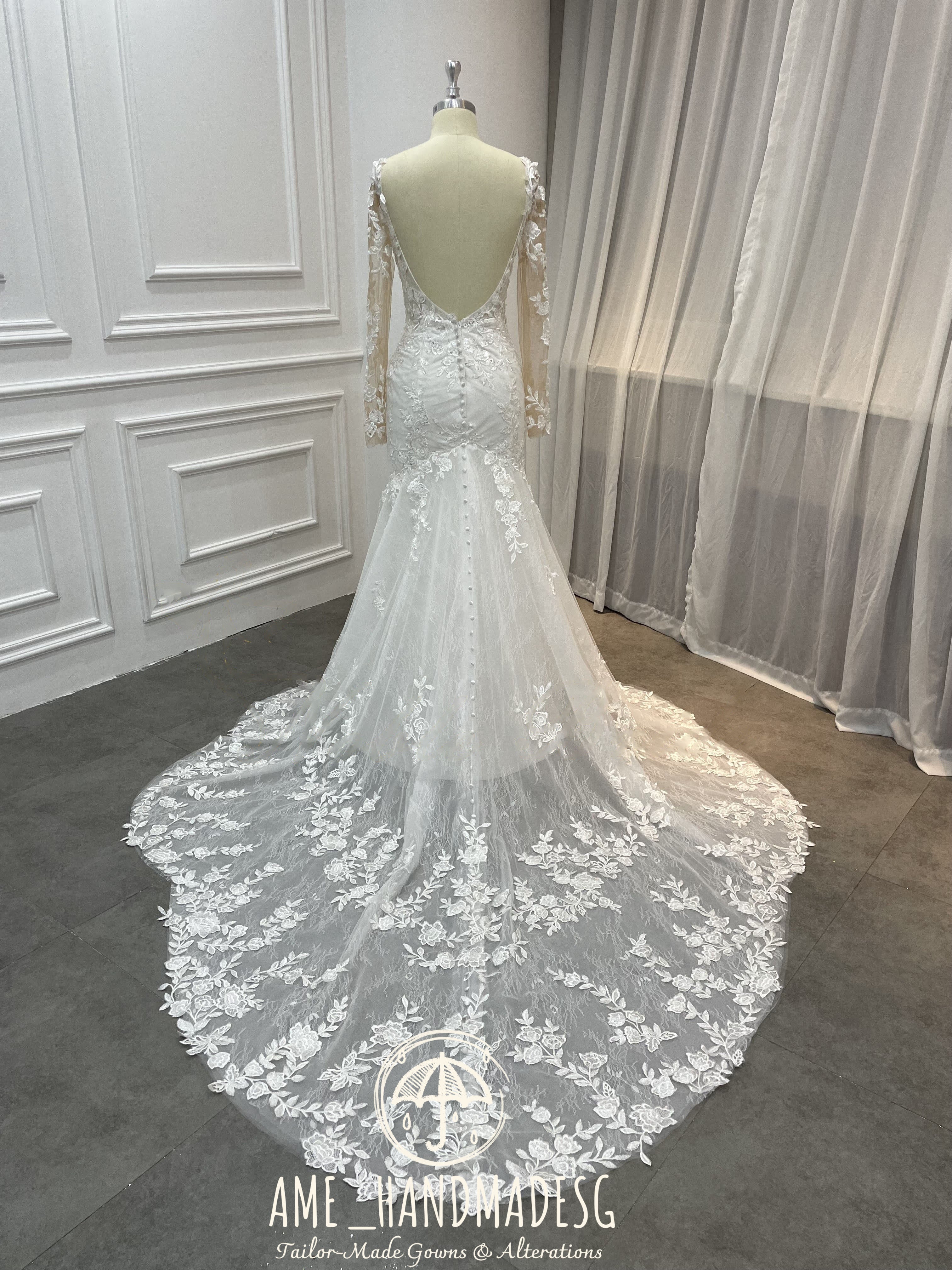 Enchanted Elegance Mermaid Gown with Illusion Sleeves and Floral Train - Image 2