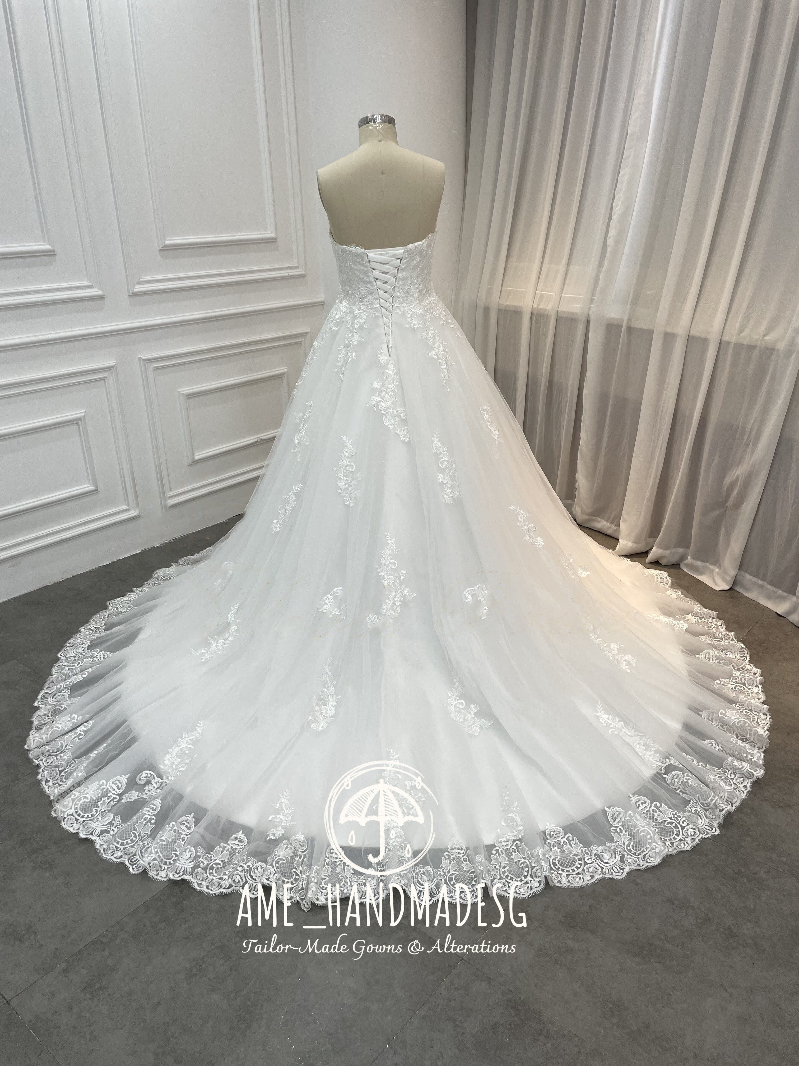 Timeless Romance Strapless Ball Gown with Scalloped Lace Train - Image 2