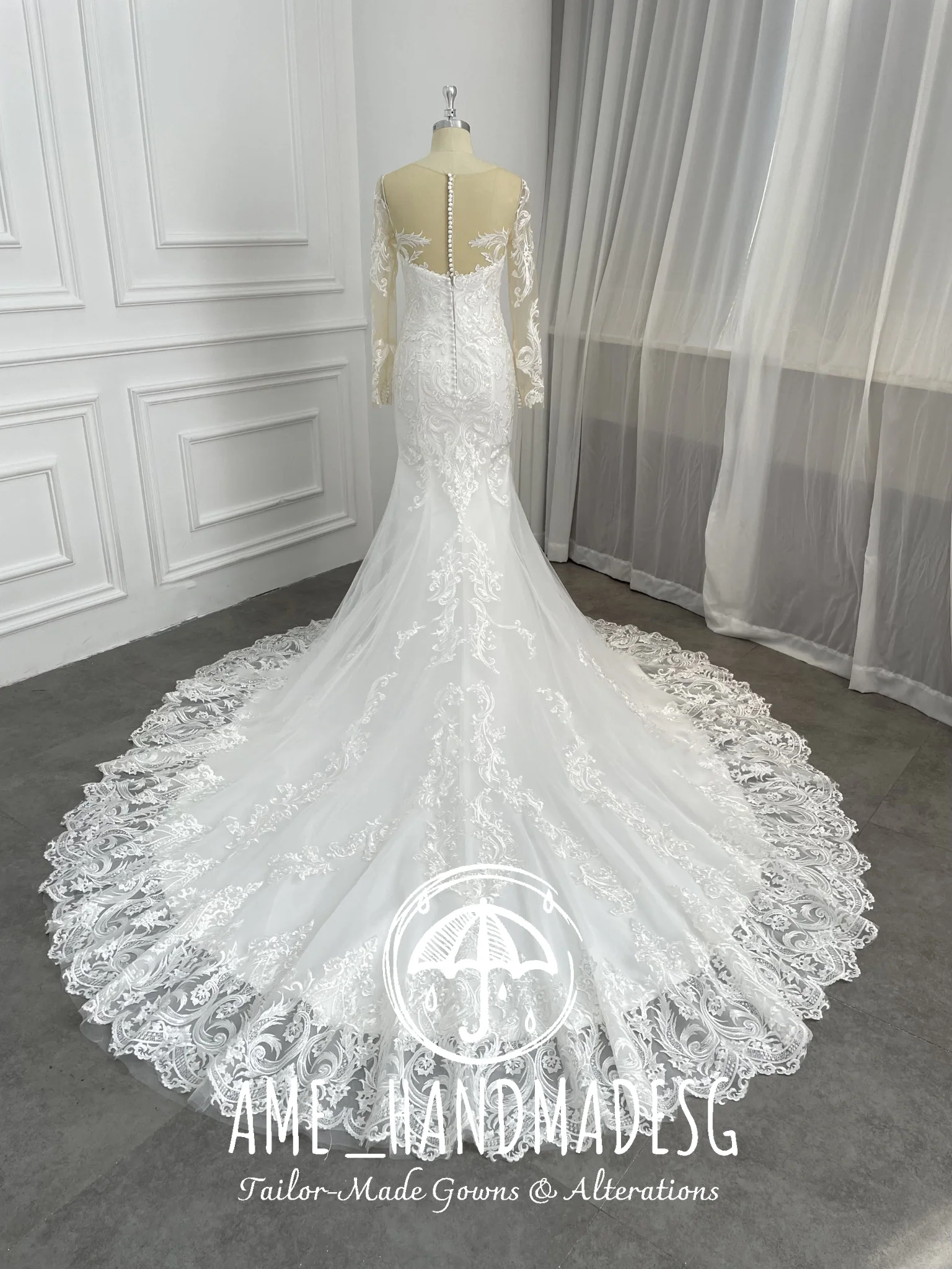 Elegant Long-Sleeve Lace Mermaid Wedding Gown with Illusion Neckline & Chapel Train