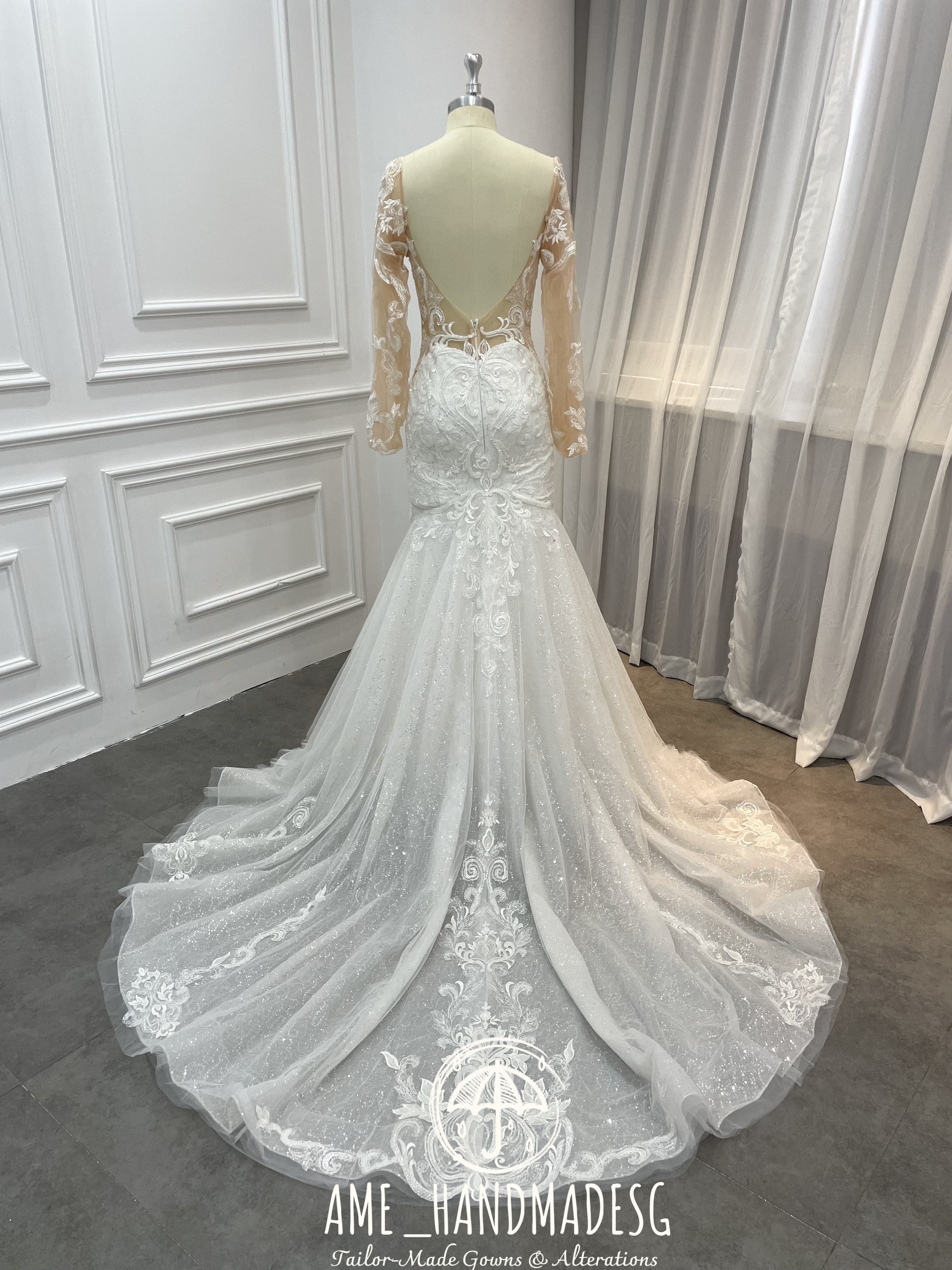 Enchanted Elegance Mermaid Gown with Illusion Sleeves and Sparkling Train - Image 2